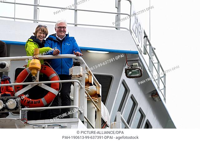 13 June 2019, Iceland, Westmännerinseln: Federal President Frank-Walter Steinmeier and his wife Elke Büdenbender visit the fishing trawler ""Breki"" and stand...