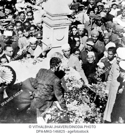 Mahatma Gandhi's dead body leaving Birla House , Delhi , for its funeral , 31st January 1948 , Mahatma Gandhi's son Ramdas , Jawaharlal Nehru , India NO MR