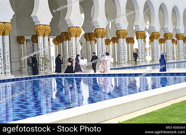 Tourists visiting the Sheikh Zayed Mosque. Abu Dhabi. United Arab Emirates