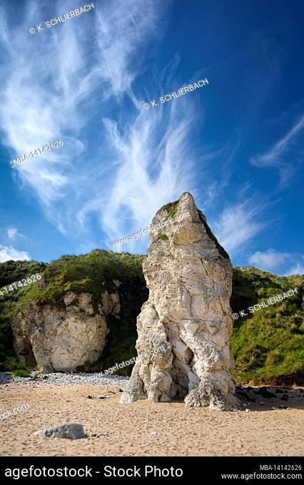 europe, northern ireland, county antrim, causeway coast, white rocks, shell limestone tower on the sandy beach at portrush