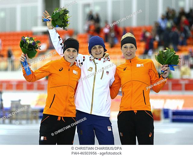 Gold medalist Martina Sablikova (C) of the Czech Republic, flanked by silver medalist Ireen Wust (L) of the Netherlands and bronze medalist Carien Kleibeuker of...