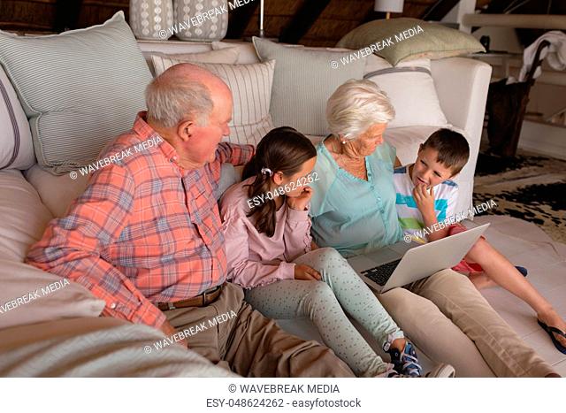 Multi-generation family using laptop