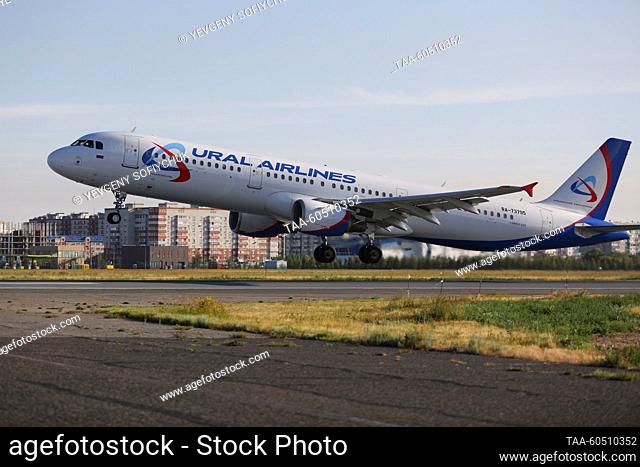 RUSSIA, OMSK - JULY 17, 2023: An Airbus A321-200 plane of Ural Airlines flies over Omsk Central International Airport named after Dmitry Karbyshev (1880-1945)
