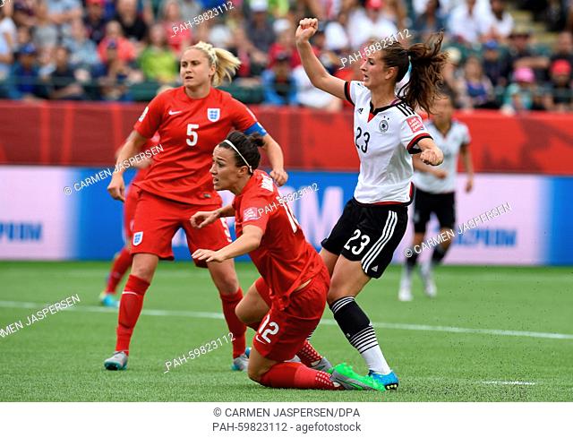 Germany's Sara Däbritz (R) and Steph Houghton (L) and Lucy Bronze from England vie for the ball during the FIFA Women's World Cup 2015 third place soccer match...