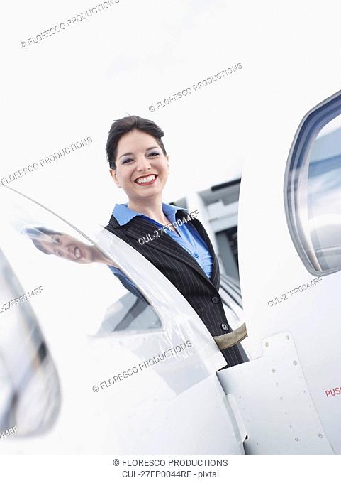 Business woman on corporate jet