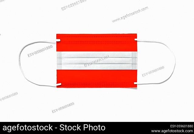 Flag of Austria on a disposable surgical mask. White background isolated