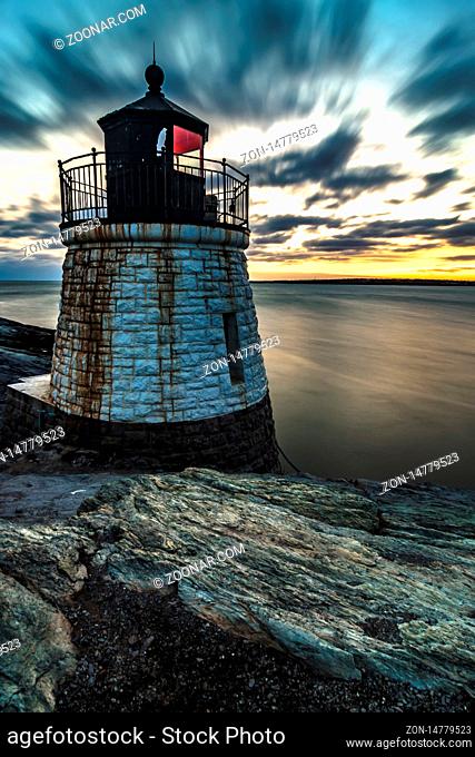 sunset in newport rhode island at castle hill lighthouse