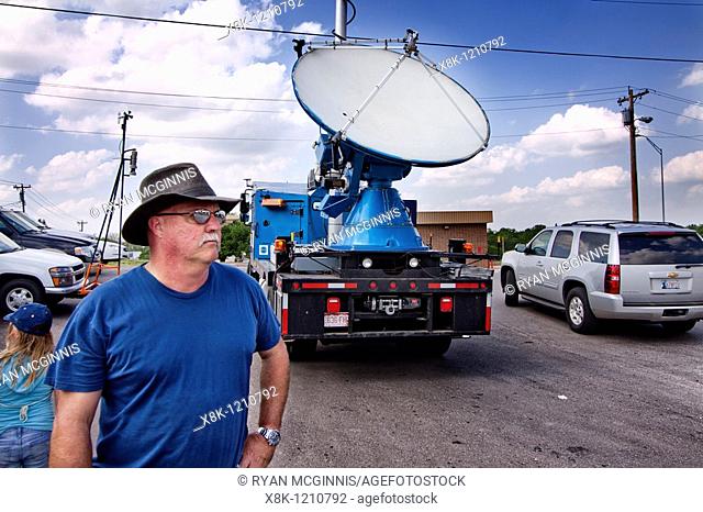 Project Vortex 2 participant and storm chaser Dennis Sherrod stands by the Doppler on Wheels radar truck in New Cordell, Oklahoma, May 11