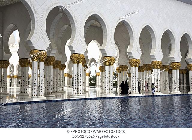 ABU DHABI, UAE, November 2018, Tourist inside Sheikh Zayed Grand Mosque, largest mosque in the country