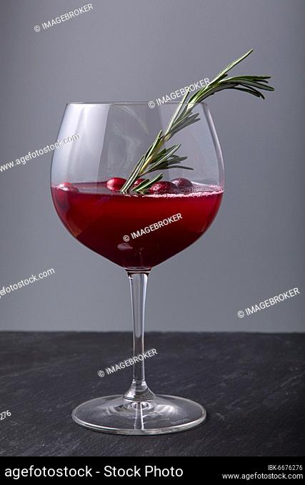 Cranberry cocktail on black surface