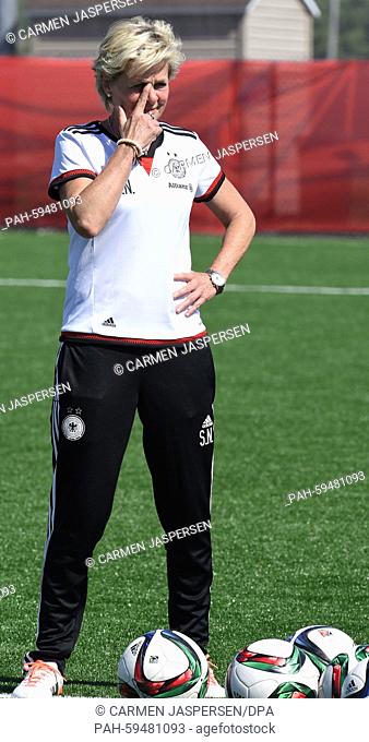Germany's head coach Silvia Neid gestures during a training session at the FIFA Women's World Cup 2015 at the Avenue Bois-de-Boulogne, Laval in Montreal, Canada
