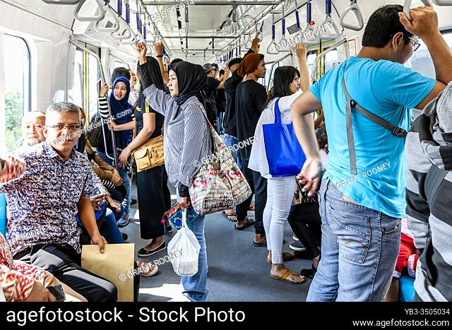 Passengers On The Metro (MRT), Jakarta, Indonesia