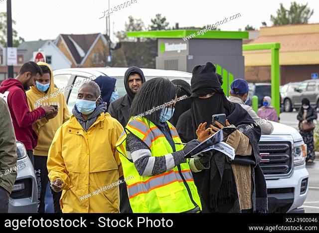 Hamtramck, Michigan USA - 21 October 2021 - A worker checked ID as water filters were distributed to residents after high lead levels were found in the city's...