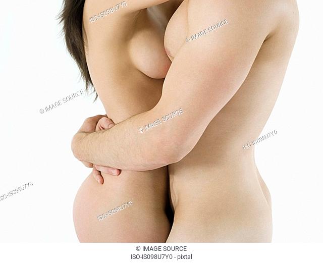 Close up of nude couple in embrace
