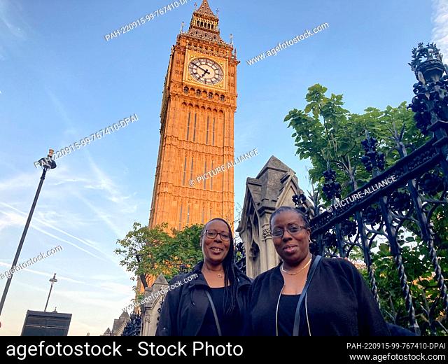 14 September 2022, Great Britain, London: Yvette (r, 59) and Helen Roberts (53) from Bedfordshire after their visit to the Queen's coffin at Westminster Hall