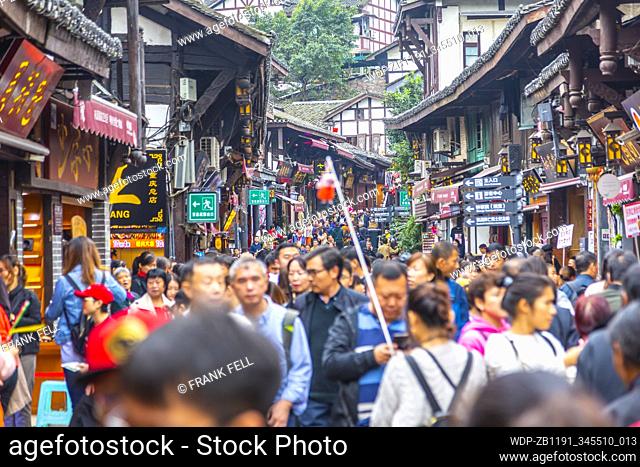 Busy shopping street in Ciqikou Old Town, Shapingba, Chongqing, China, Asia