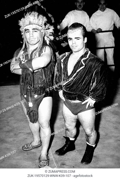 Jan. 29, 1957 - Paris, France - Little wrestlers, BEAUER and TINY TIM, two midget athlets, in costume before the fight. (Credit Image: © Keystone Press...