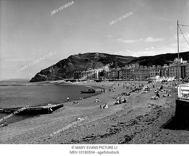 View of the beach and seafront at the popular Mid Wales seaside resort of Aberystwyth, Ceredigion