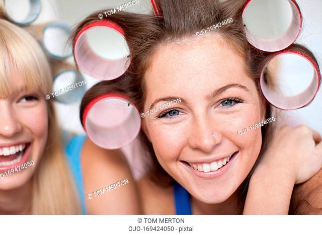 Women with curlers in hair