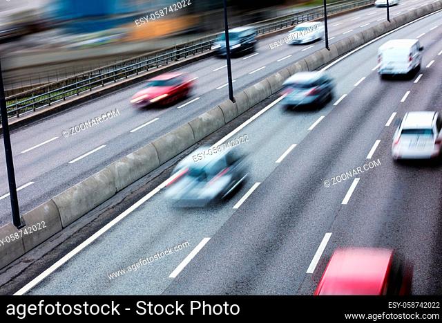 cars on the freeway at high speed