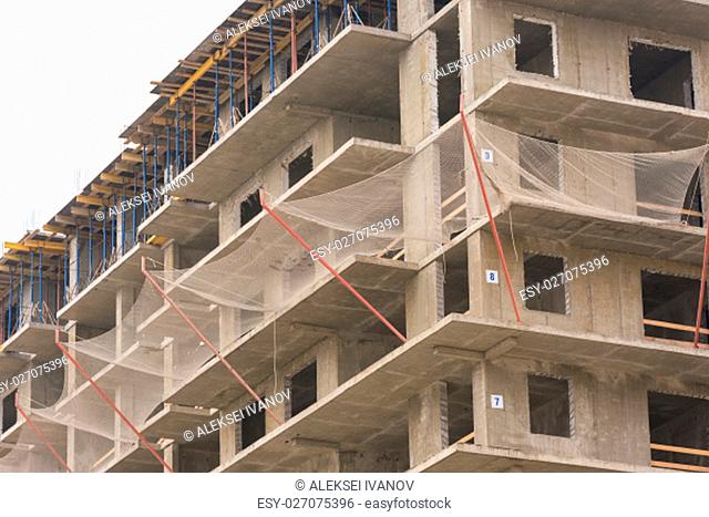Protective guard from falling objects during the construction of multi-storey residential building
