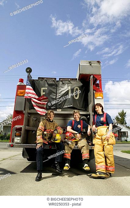 Portrait of three firefighters