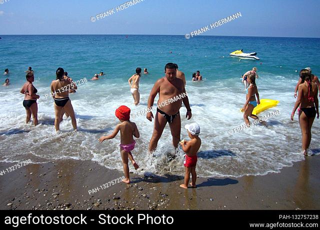 Holidays in times of the coronavirus pandemic. Archive photo: turkish, riviera, beach, people, holidaymaker, vacation, sea, beach vacation, beach vacation
