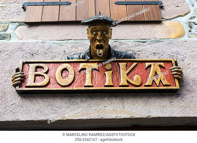 Carved wooden signboard of a pharmacy in the village of Etxalar. Etxalar, Cinco Villas, Bortziriak, Navarre, Spain, Europe