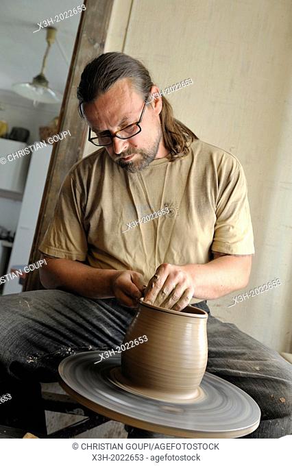 Ivars, potter craftman in his workshop at Kemeri, Jurmala, Gulf of Riga, Latvia, Baltic region, Northern Europe