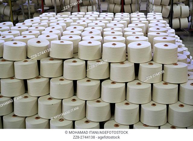 Cotton spools inside cotton mill Multan Pakistan