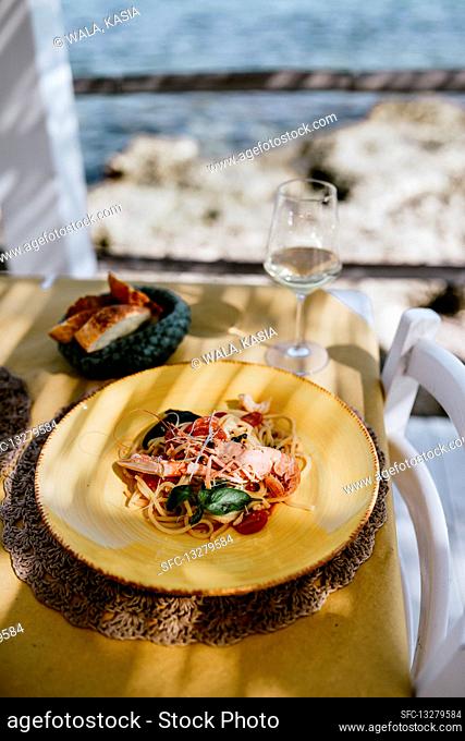 Italian spaghetti with cherry tomatoes and prawns