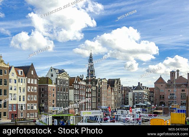 Amsterdam Damrak street, from where boat trips depart. Without a doubt a beautiful urban landscape