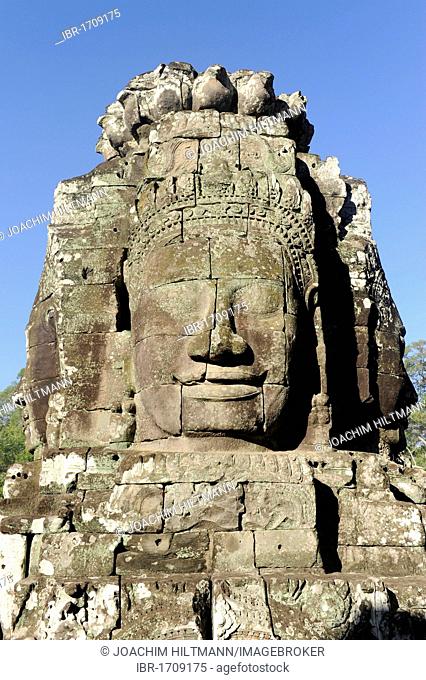 Carved stone face of Bodhisattva Lokeshvara over the south gate of Angkor Thom, Angkor, UNESCO World Heritage Site, Siem Reap, Cambodia, Southeast Asia, Asia