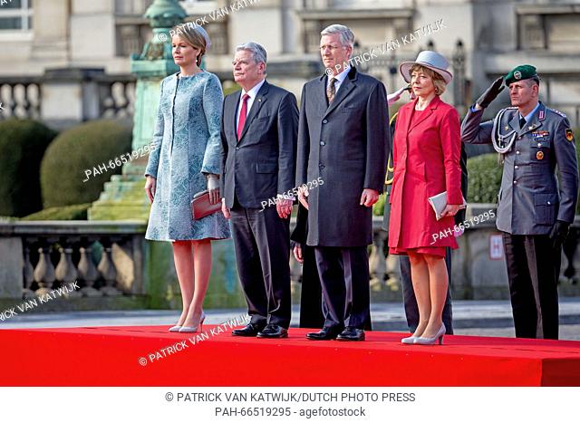 King Philippe and Queen Mathilde of Belgium welcome German president Joachim Gauck and his partner Daniela Schadt during official welcome ceremony at the Royal...