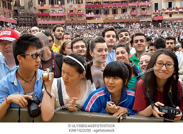 people in the campo square, palio of siena, siena, tuscany, italy, europe