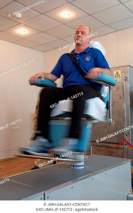 At the Cosmonaut Hotel crew quarters in Baikonur, Kazakhstan, Expedition 47-48 crewmember Jeff Williams of NASA takes a ride in a spinning chair March 12 as...