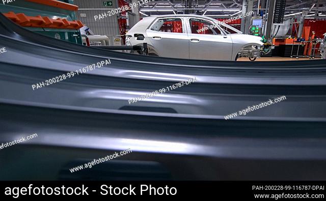 25 February 2020, Saxony, Zwickau: Parts for the new VW ID.3 are assembled in the body shop of the Volkswagen plant in Saxony