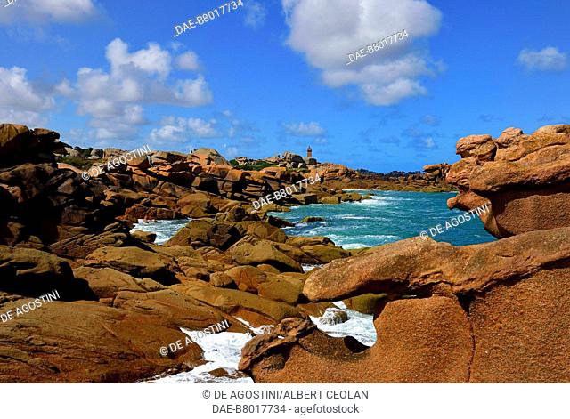 A stretch of the Pink Granite Coast, Mean Ruz lighthouse in the background, Ploumanac'h, Brittany, France