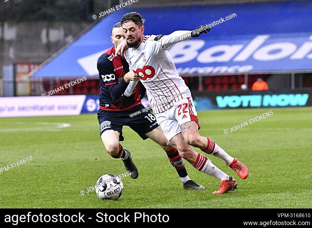 RFC Liege's Benoit Nyssen and Standard's Maxime Lestienne fight for the ball during a friendly soccer game between Standard de Liege and RFC Liege