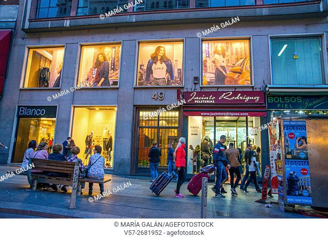Shops, night view. Gran Via street, Madrid, Spain
