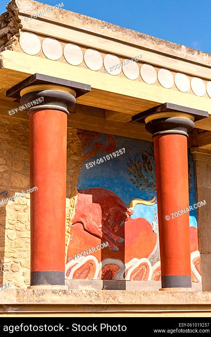 Close-up red columns, North Entrance of ancient Minoan Palace in Knossos at Crete, Greece