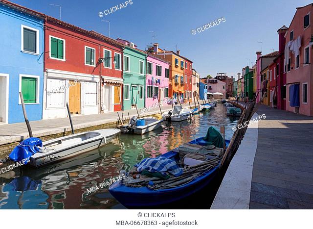 Burano island, Venice. The typical colorful houses along the canal