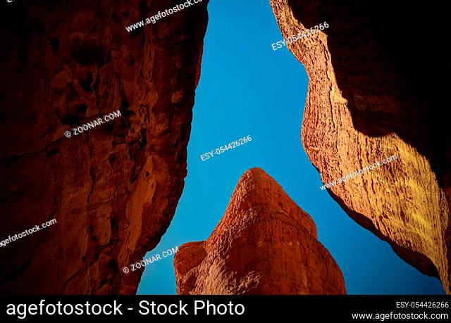 Bottom-up view to Abstract Rock formation at plateau Ennedi aka stone forest , Chad
