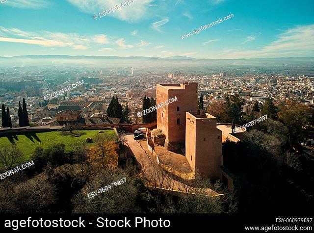 Aerial picturesque drone point of view Granada castle surrounding lands and cityscape, Alhambra or Red Castle, located on top of hill al-Sabika