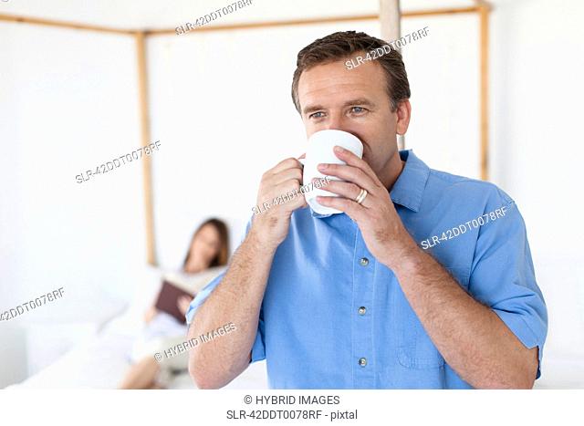Close up of man drinking coffee