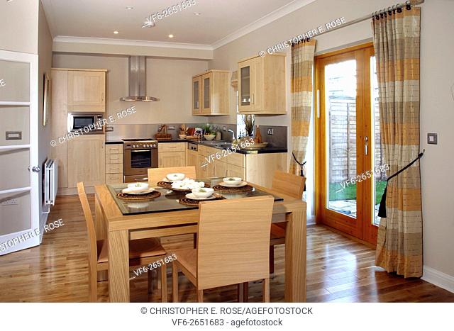 UK showhome interior, fitted kitchen and dining area. For Editorial Use Only