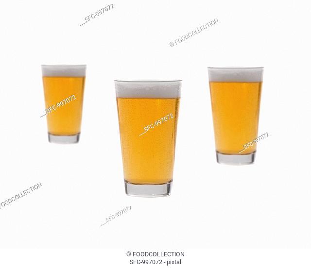 Three glasses of lager