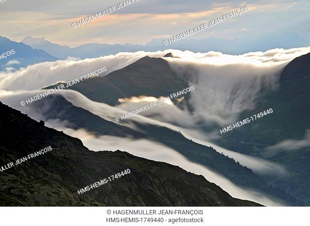 France, Haute Savoie, Chamonix Mont Blanc, clouds on the col de Balme (2191m), alpinist