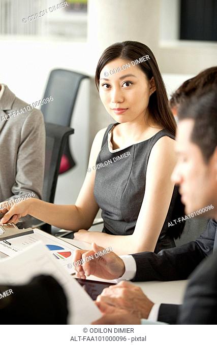 Businesswoman at corporate meeting
