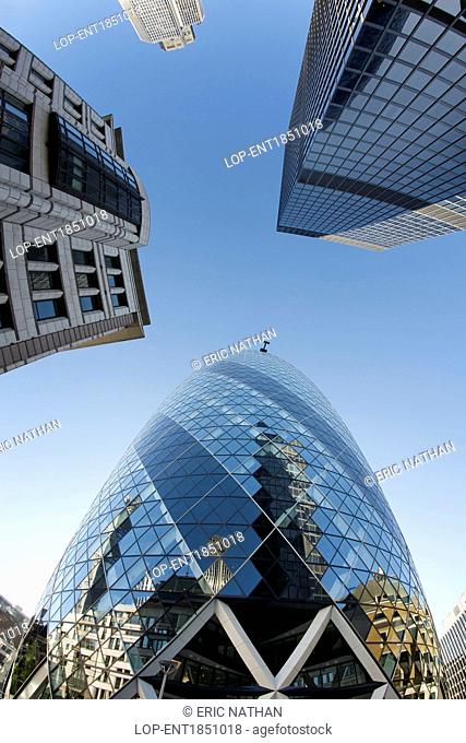 England, London, The City of London. 30 St Mary Axe also known as the Gherkin and the Swiss Re Building and surrounding buildings in the financial district of...